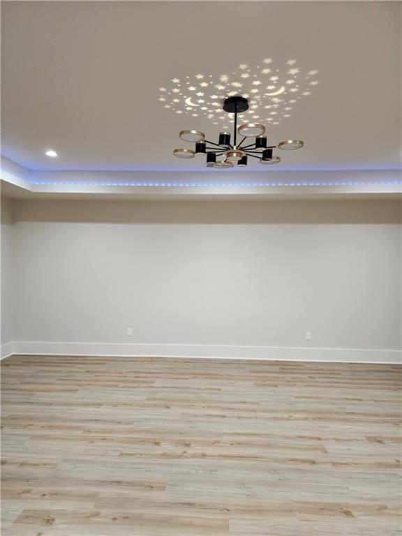 1694 Harts Mill Road Northeast Brookhaven, GA 30319 - Photo 33 of 44 a view of a room with window and wooden floor