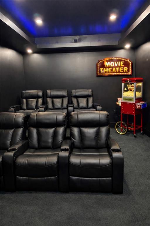 1694 Harts Mill Road Northeast Brookhaven, GA 30319 - Photo 36 of 44 a media room with lots of chairs and a projector