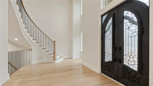 a view of staircase with rug floor