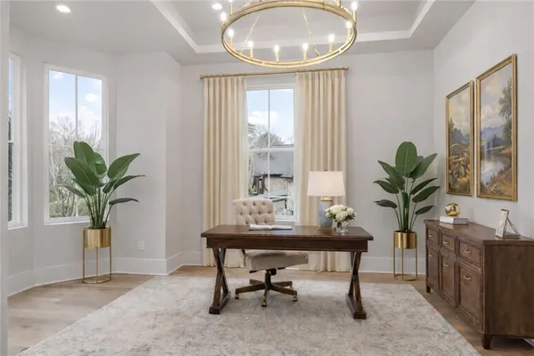 a view of a room with furniture window and wooden floor