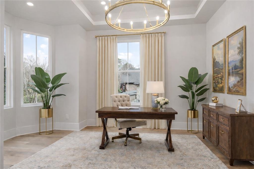 1694 Harts Mill Road Northeast Brookhaven, GA 30319 - Photo 6 of 44 a view of a room with furniture window and wooden floor