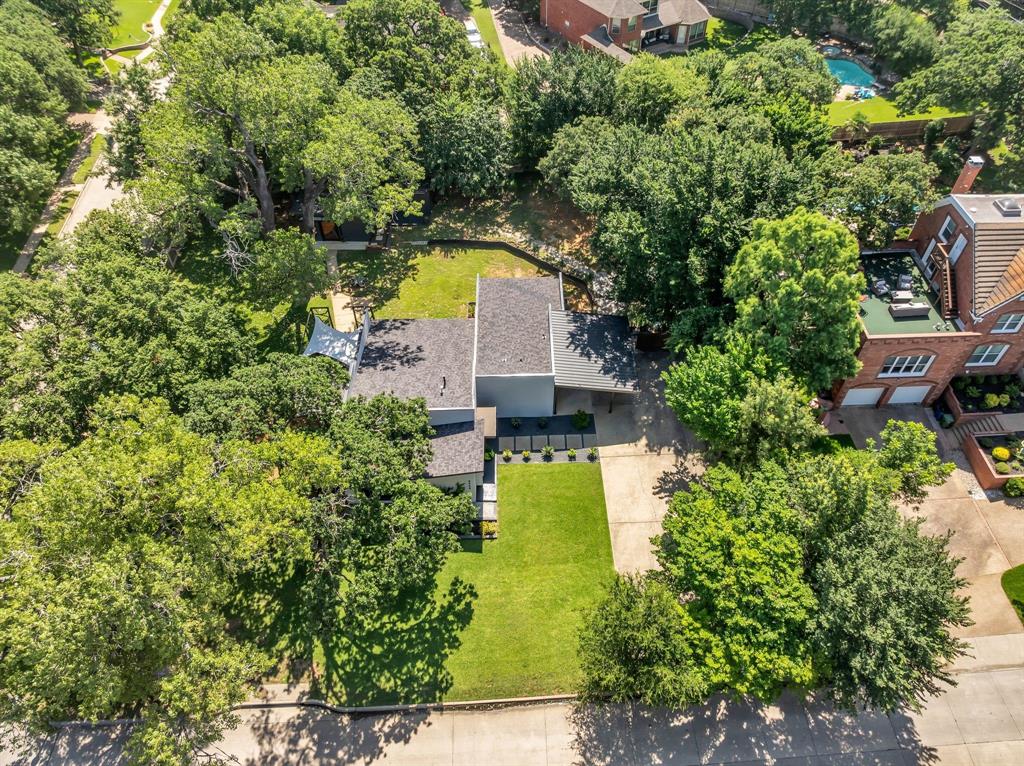 3449 West T Parr Road Grapevine, TX 76051 - Photo 3 of 32 an aerial view of a house with a yard swimming pool and tennis court