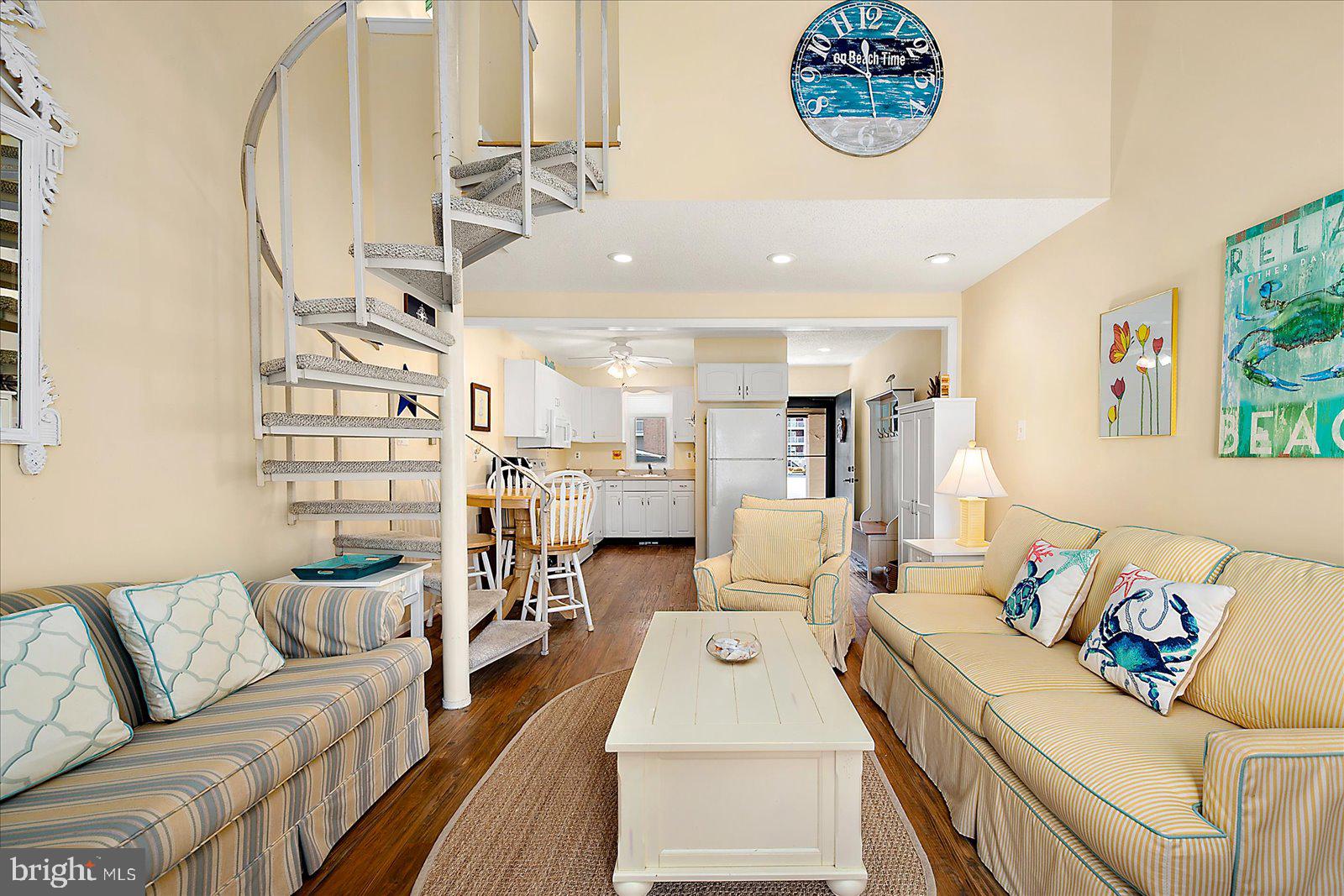 616 Salt Spray Road, Unit 7 Ocean City, MD 21842 - Photo 13 of 53 SPIRAL STAIRS LEAD TO THE UPSTAIRS