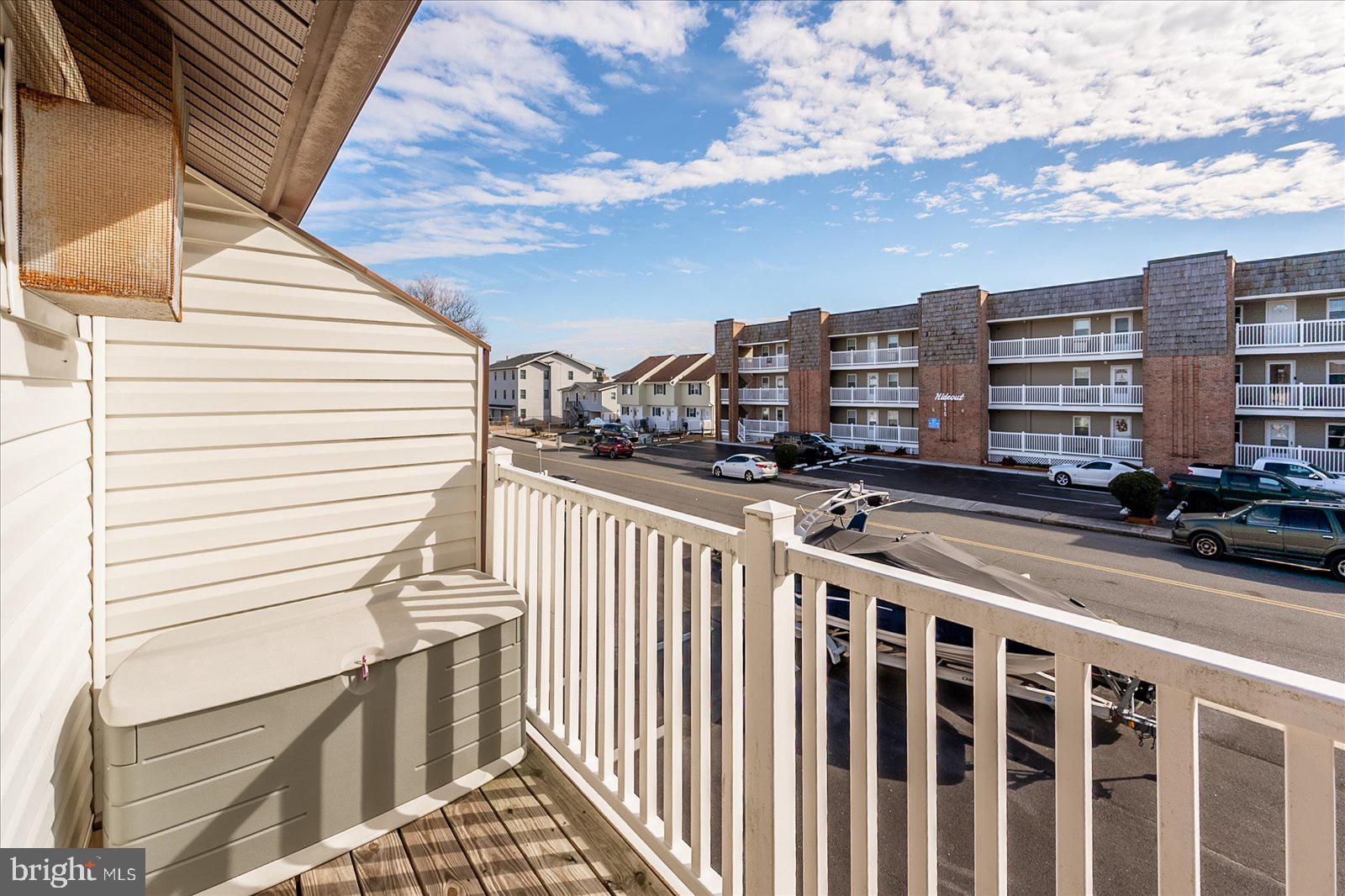 616 Salt Spray Road, Unit 7 Ocean City, MD 21842 - Photo 42 of 53 LARGE DECK WITH SLIDERSTO ENJOY A COOL BREEZE