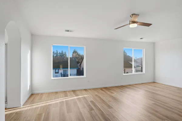 a view of an empty room with a window