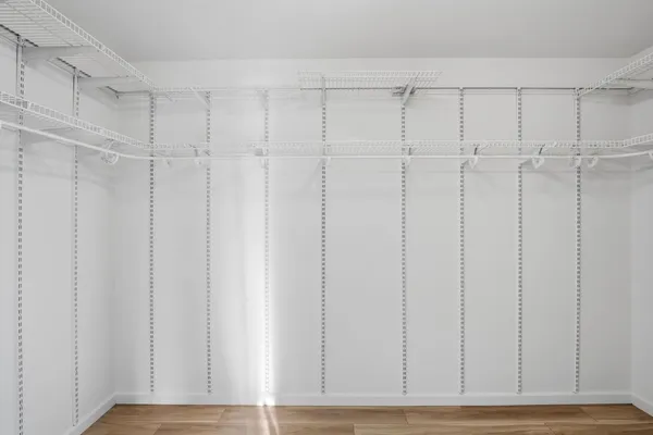 a view of a room with white walls