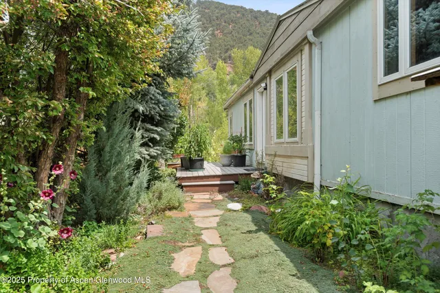 a view of a back yard of the house