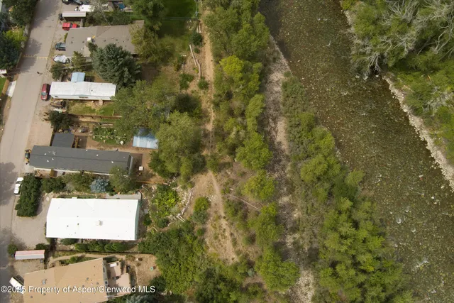 an aerial view of residential house with outdoor space