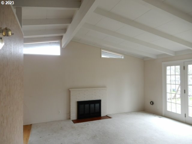 2455 Van Buren Street Eugene, OR 97405 - Photo 3 of 31 a room with a fireplace and window