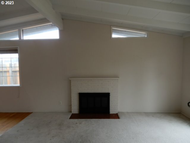 2455 Van Buren Street Eugene, OR 97405 - Photo 4 of 31 a living room with furniture and a fireplace