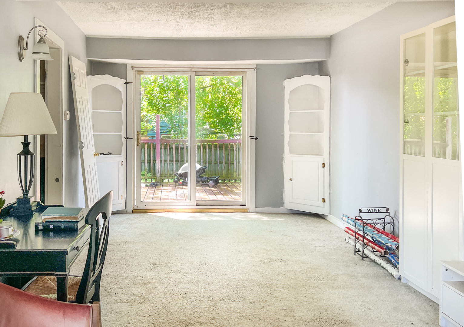 294 Seabury Road Bolingbrook, IL 60440 - Photo 3 of 17 a view of a room with furniture and floor to ceiling window