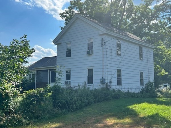233 Mort Vining Road Southwick, MA 01077 - Photo 12 of 31 a view of a house with a yard