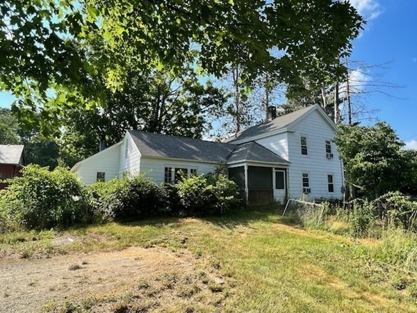 233 Mort Vining Road Southwick, MA 01077 - Photo 13 of 31 a view of a house with yard and plants