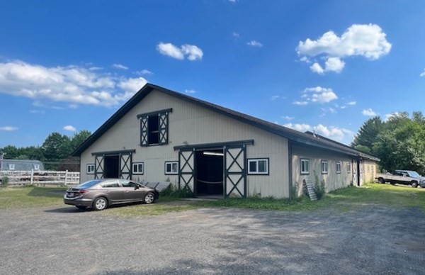 233 Mort Vining Road Southwick, MA 01077 - Photo 18 of 31 a view of a house with backyard