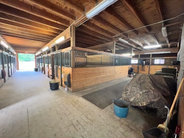 233 Mort Vining Road Southwick, MA 01077 - Photo 19 of 31 a view of water heater room with stairs