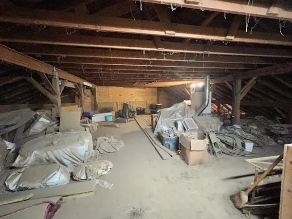 a view of staircase with wooden stairs