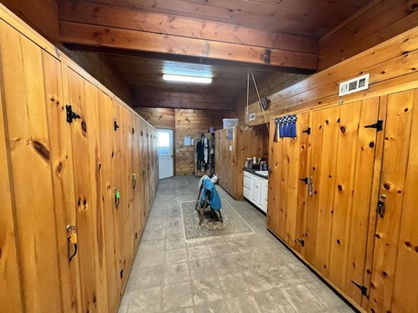 233 Mort Vining Road Southwick, MA 01077 - Photo 22 of 31 a view of a porch with wooden walls