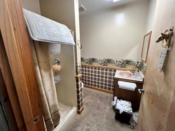 233 Mort Vining Road Southwick, MA 01077 - Photo 30 of 31 a bathroom with a sink