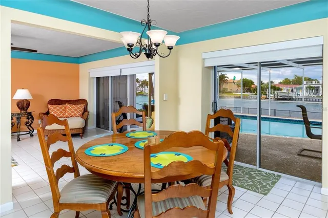 a kitchen with stainless steel appliances a stove a refrigerator and a sink