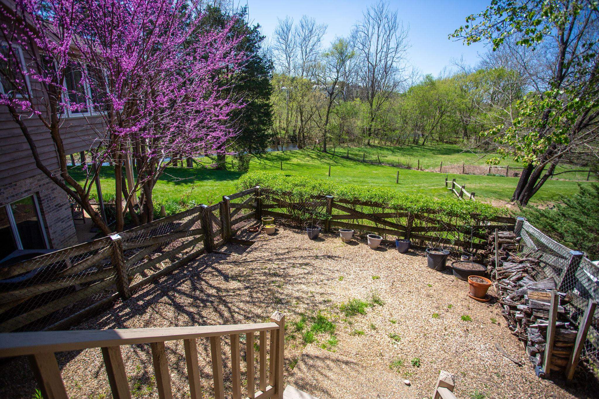 13004 Indian Trail Road Broadway, VA 22815 - Photo 54 of 56 a view of a backyard with wooden fence