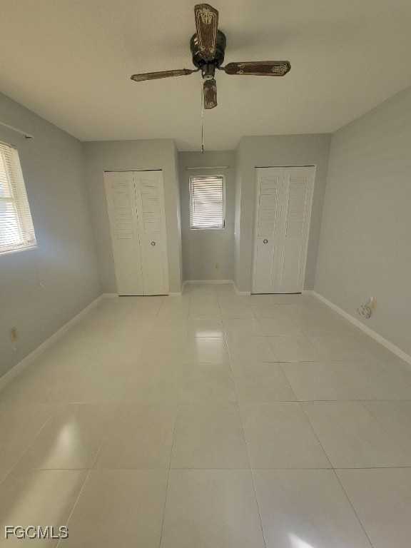 347 Richland Road Lehigh Acres, FL 33936 - Photo 11 of 16 a view of an empty room with a window
