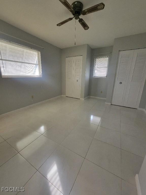 347 Richland Road Lehigh Acres, FL 33936 - Photo 10 of 16 a view of an empty room with a window
