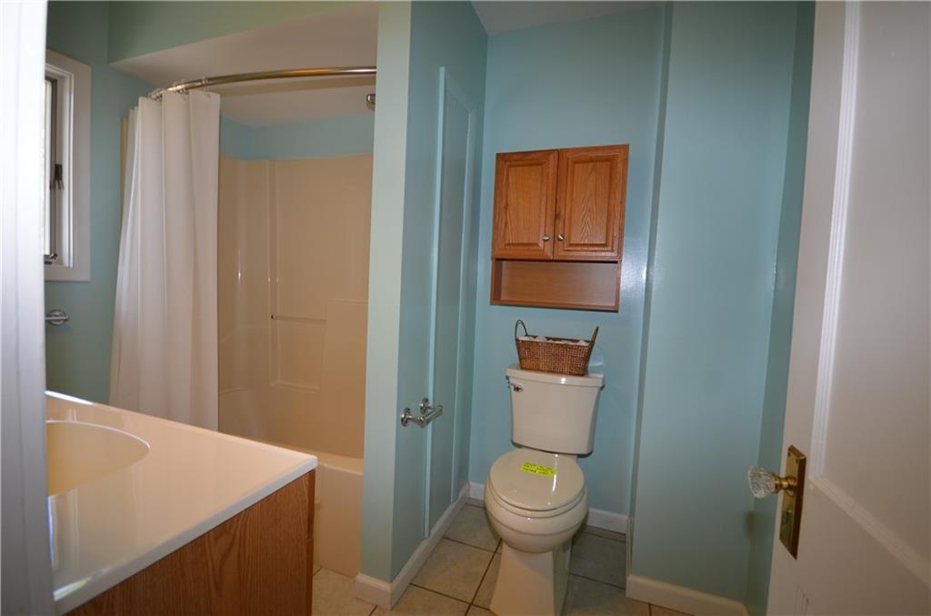 1020 6th Street Beaver, PA 15009 - Photo 18 of 33 a bathroom with a toilet a sink and shower