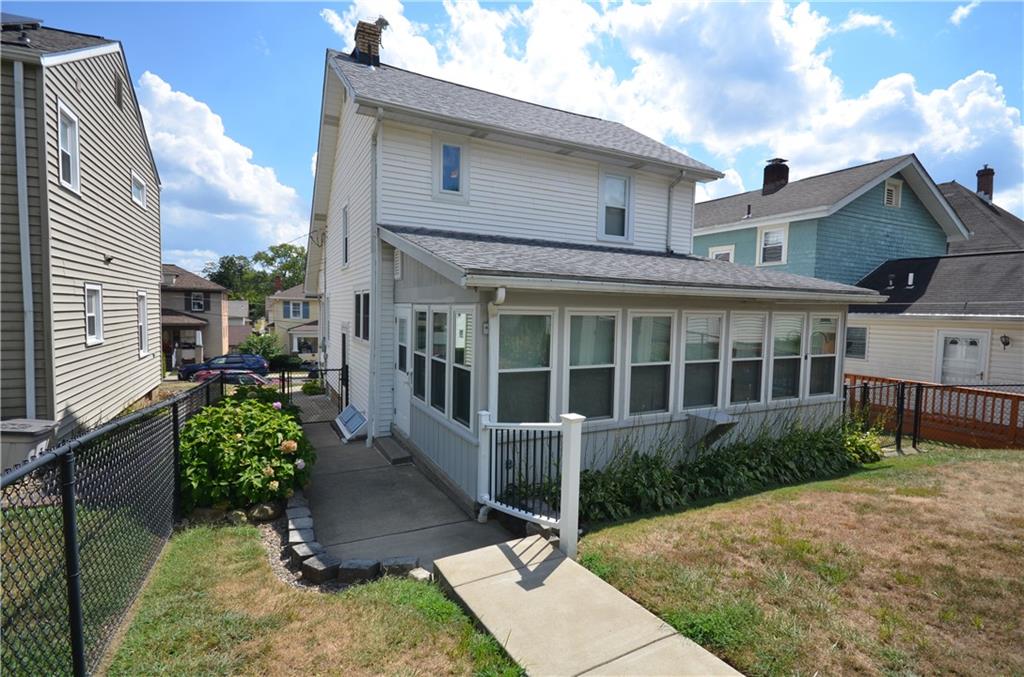1020 6th Street Beaver, PA 15009 - Photo 22 of 33 a view of a house with a small yard and sitting area