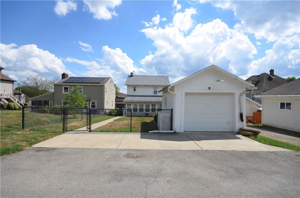 1020 6th Street Beaver, PA 15009 - Photo 26 of 33 a view of a house with a yard and garage
