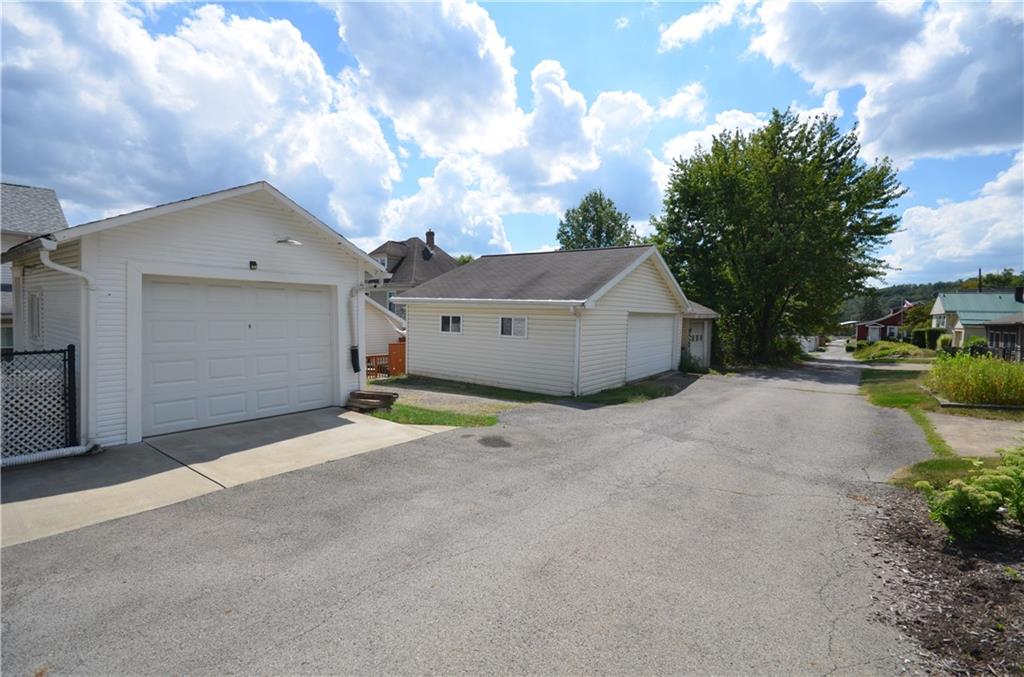 1020 6th Street Beaver, PA 15009 - Photo 27 of 33 a view of a house with a yard and garage