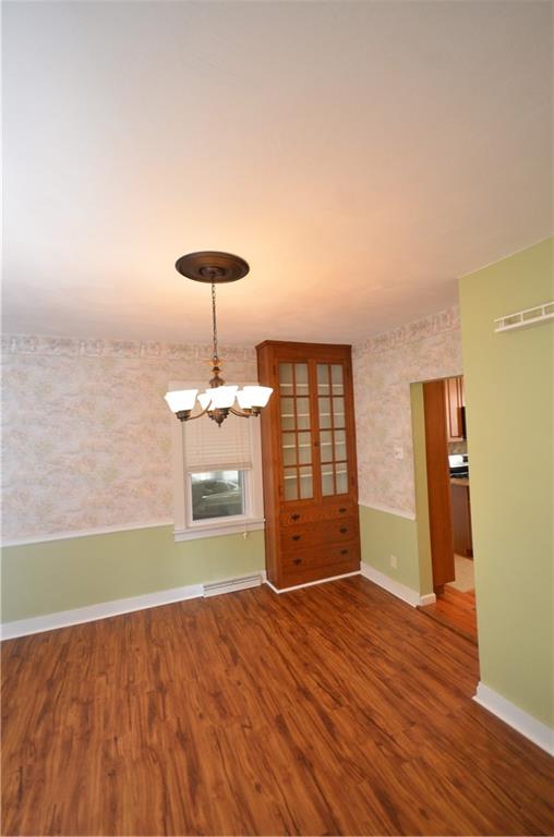 1020 6th Street Beaver, PA 15009 - Photo 7 of 33 wooden floor in an empty room with a window