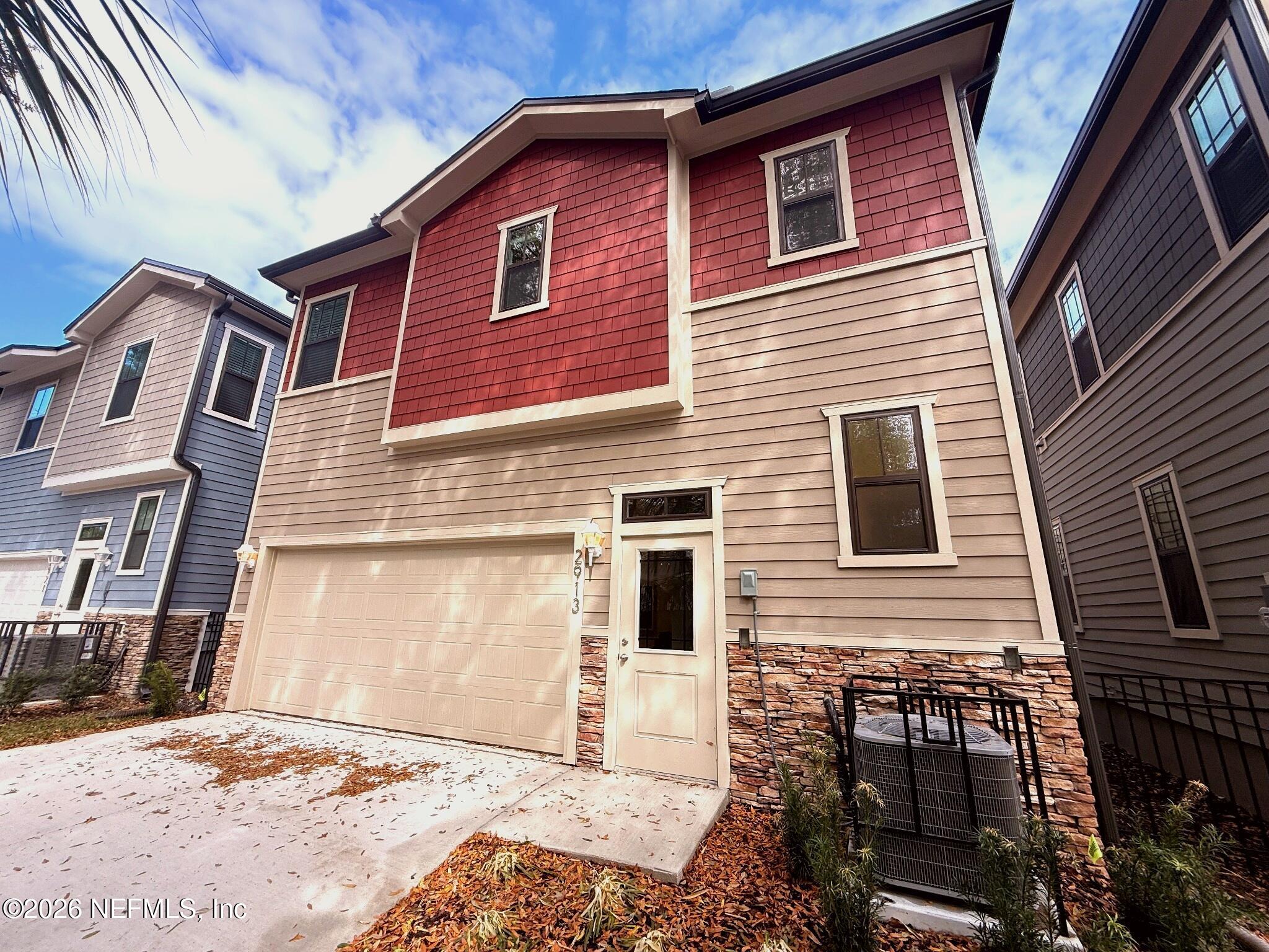 2913 Fleur Lane Jacksonville, FL 32205 - Photo 20 of 22 a front view of a house with a yard
