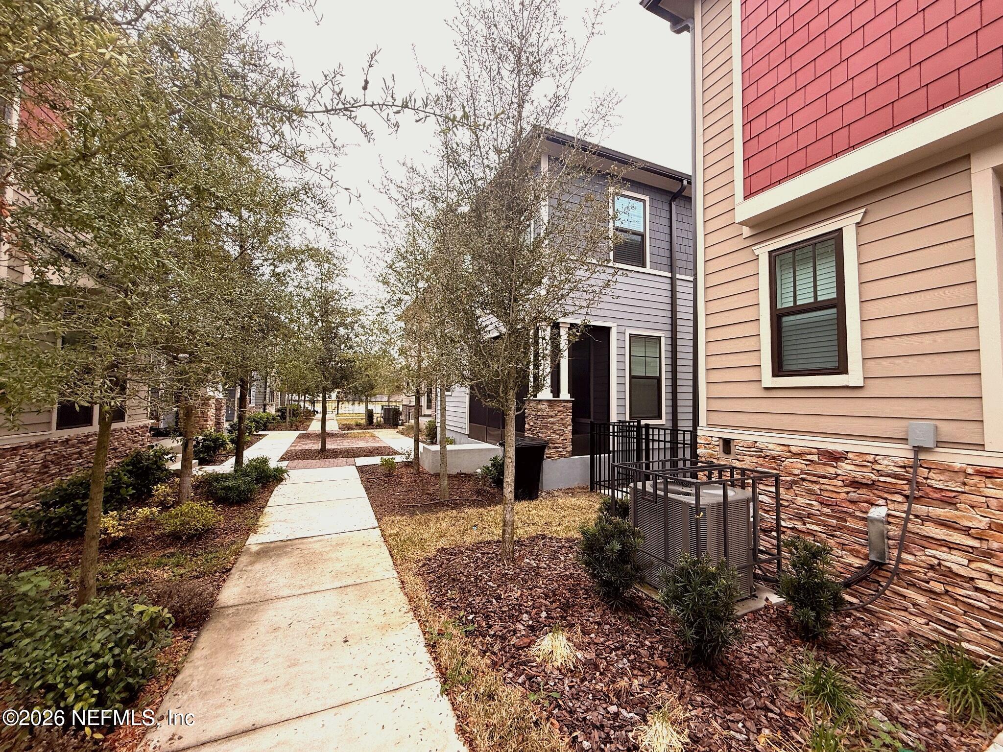 2913 Fleur Lane Jacksonville, FL 32205 - Photo 21 of 22 a front view of a house with sitting area
