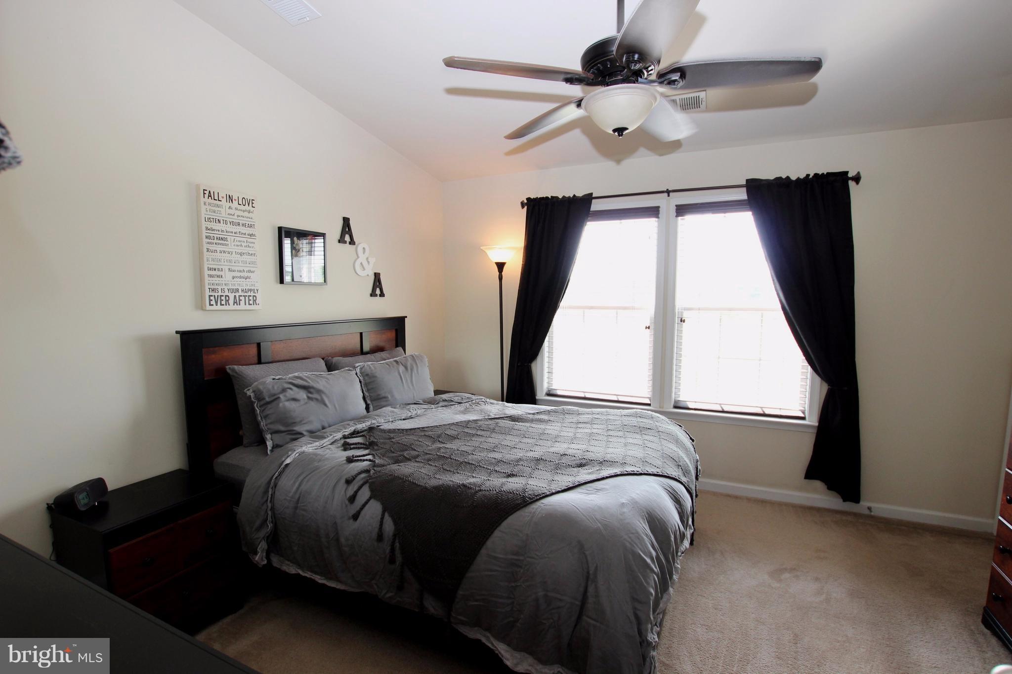 1129 Stallion Street Ranson, WV 25438 - Photo 12 of 19 a bedroom with a bed and a window