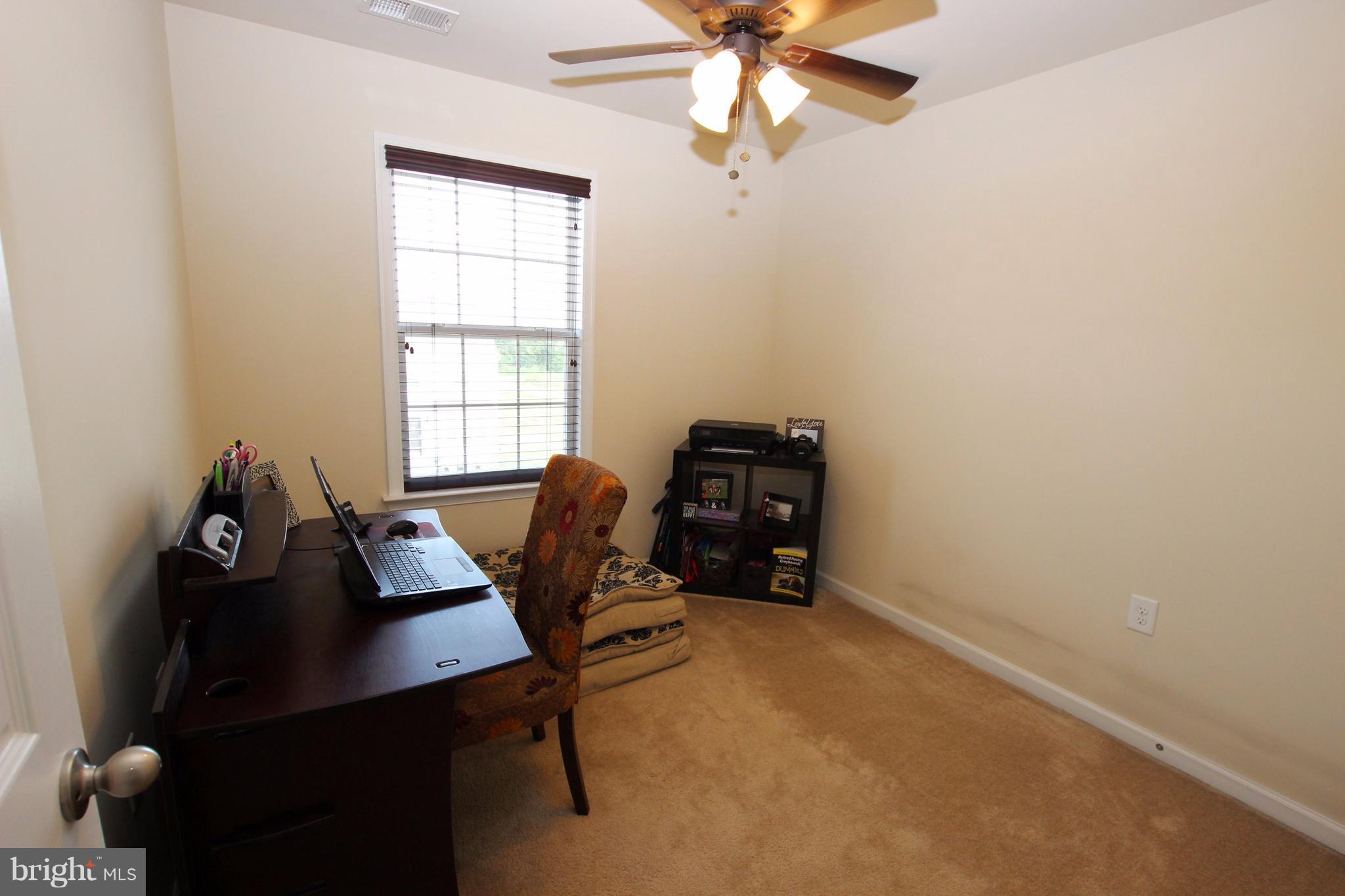 1129 Stallion Street Ranson, WV 25438 - Photo 15 of 19 a room with a workspace