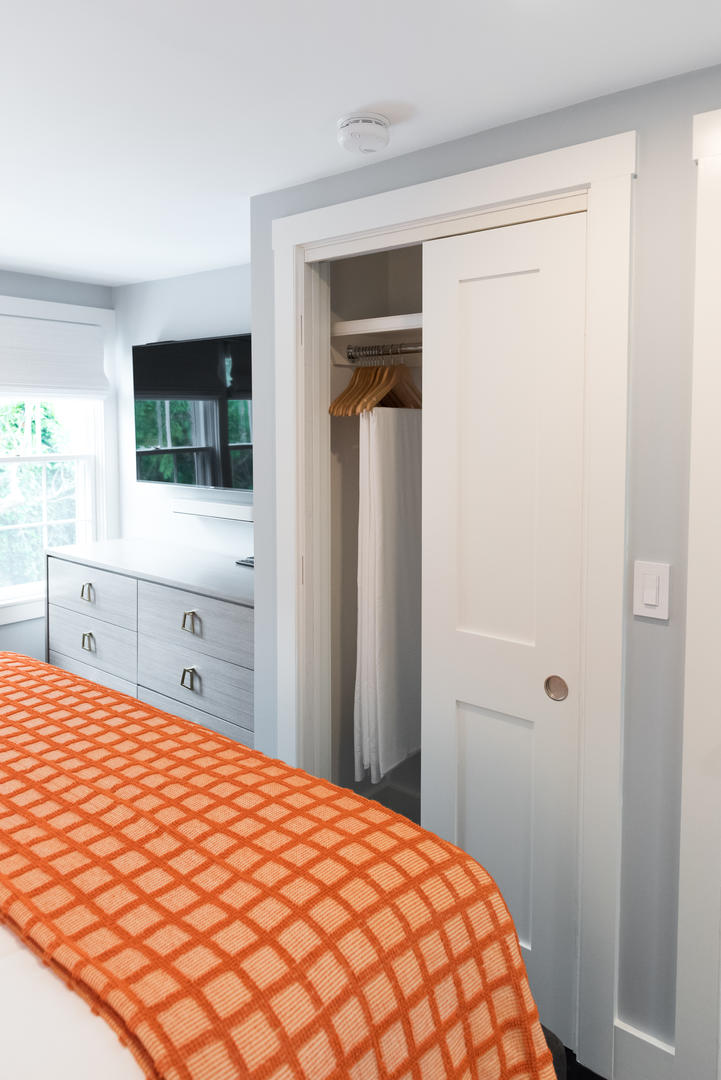 59 Orange Street Nantucket, MA 02554 - Photo 23 of 42 a bedroom with a bed and a flat screen tv