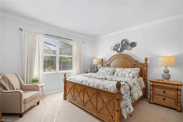a bedroom with a bed and furniture