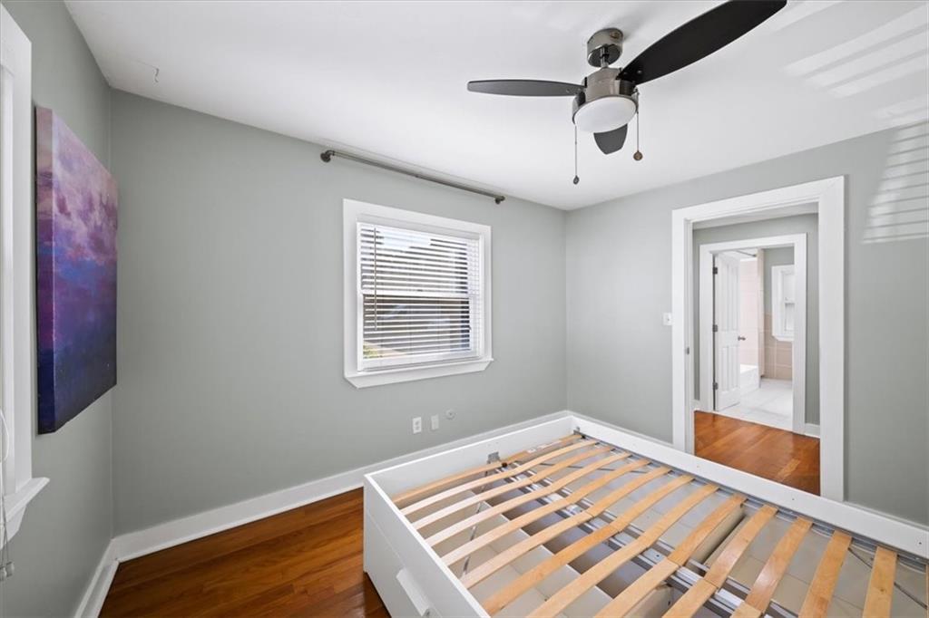 866 Briarcliff Road Northeast, Unit D2 Atlanta, GA 30306 - Photo 21 of 42 a view of a room with a ceiling fan and a window
