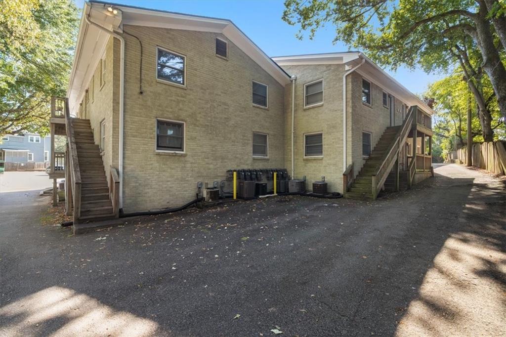 866 Briarcliff Road Northeast, Unit D2 Atlanta, GA 30306 - Photo 28 of 42 a view of a house with a yard