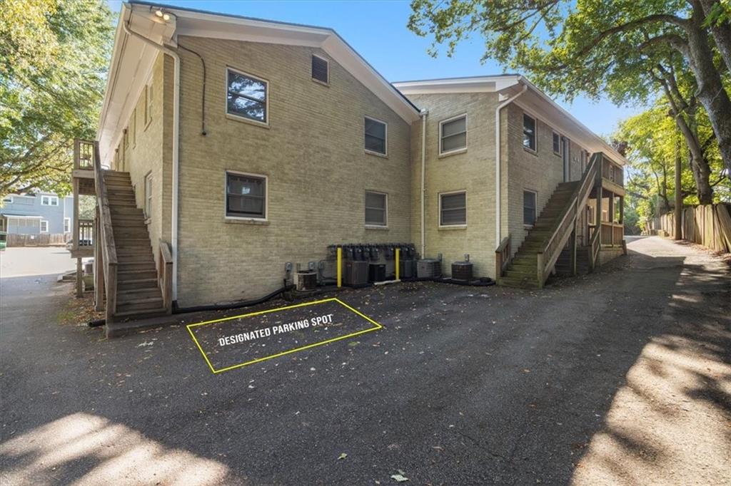 866 Briarcliff Road Northeast, Unit D2 Atlanta, GA 30306 - Photo 30 of 42 a view of front a house with a yard