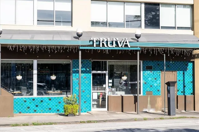 a front view of a building with street