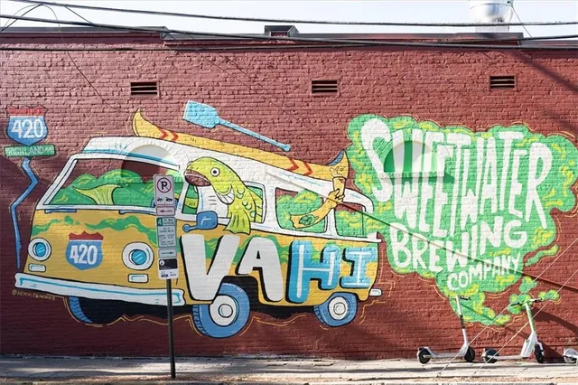 an aerial view of multiple houses with yard