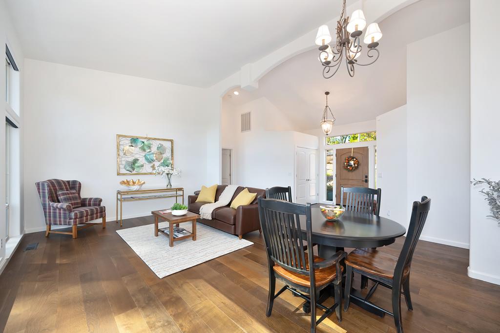 19676 Eagle Ridge Road Foresthill, CA 95631 - Photo 11 of 68 a living room with furniture and a chandelier