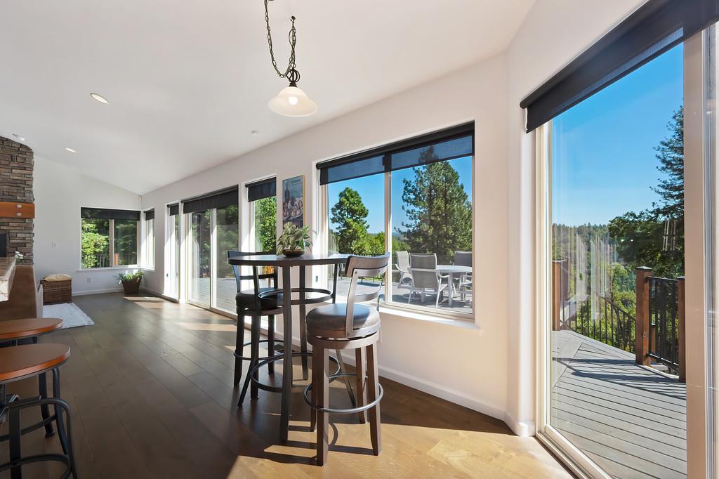 19676 Eagle Ridge Road Foresthill, CA 95631 - Photo 18 of 68 a view of a dining room with furniture window and outside view