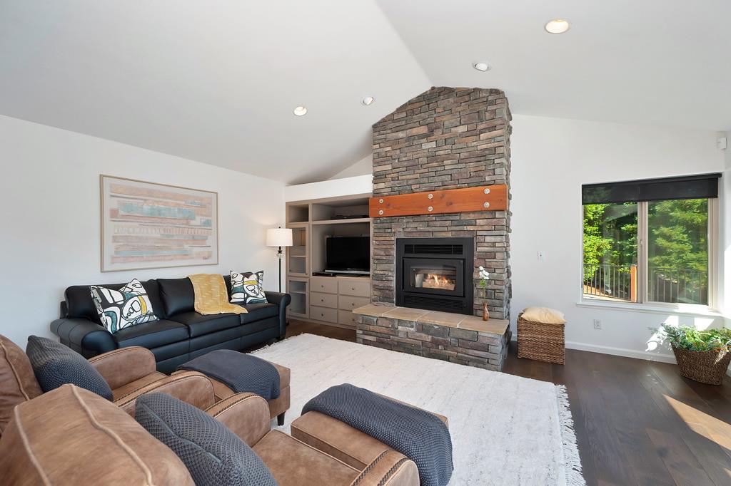 19676 Eagle Ridge Road Foresthill, CA 95631 - Photo 23 of 68 a living room with furniture and a fireplace