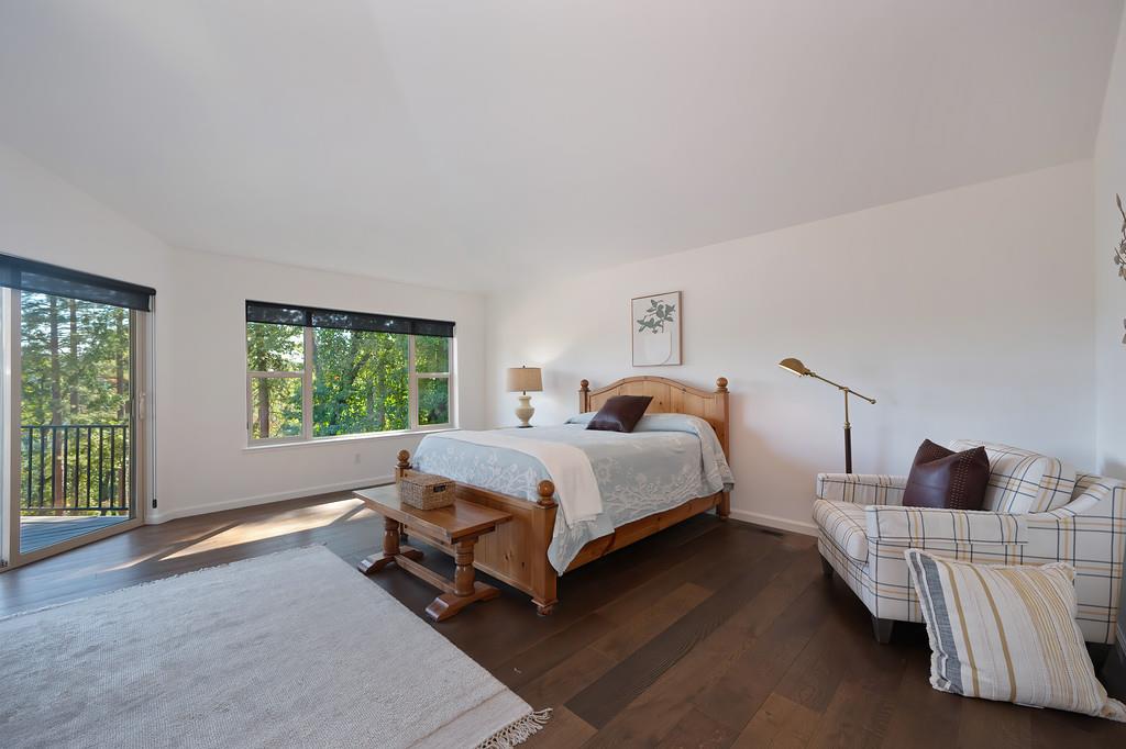 19676 Eagle Ridge Road Foresthill, CA 95631 - Photo 32 of 68 a bedroom with a bed and a window