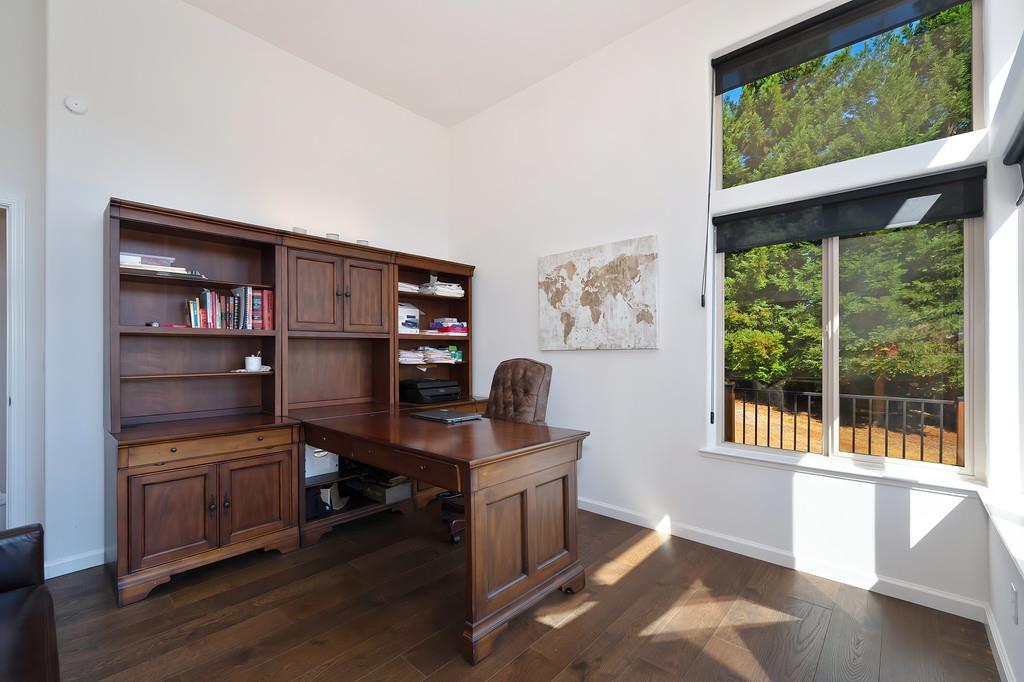 19676 Eagle Ridge Road Foresthill, CA 95631 - Photo 38 of 68 a view of a workspace with furniture and a window