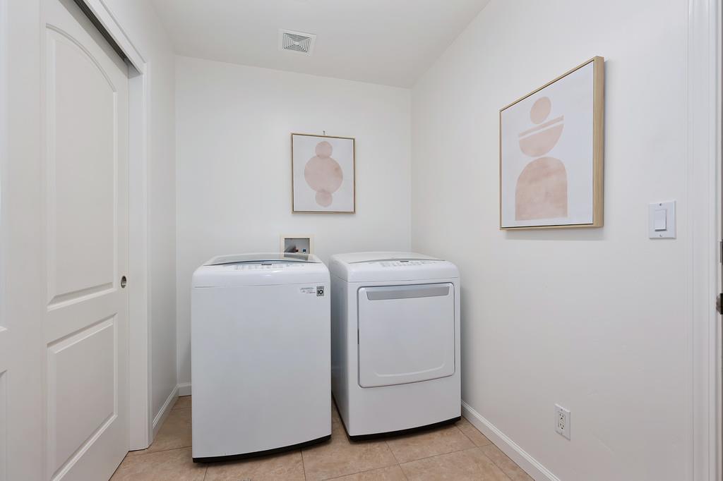 19676 Eagle Ridge Road Foresthill, CA 95631 - Photo 46 of 68 a utility room with dryer and washer