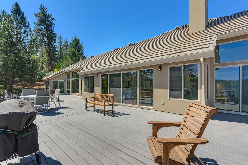 19676 Eagle Ridge Road Foresthill, CA 95631 - Photo 54 of 68 a view of a house with backyard sitting area and sitting area