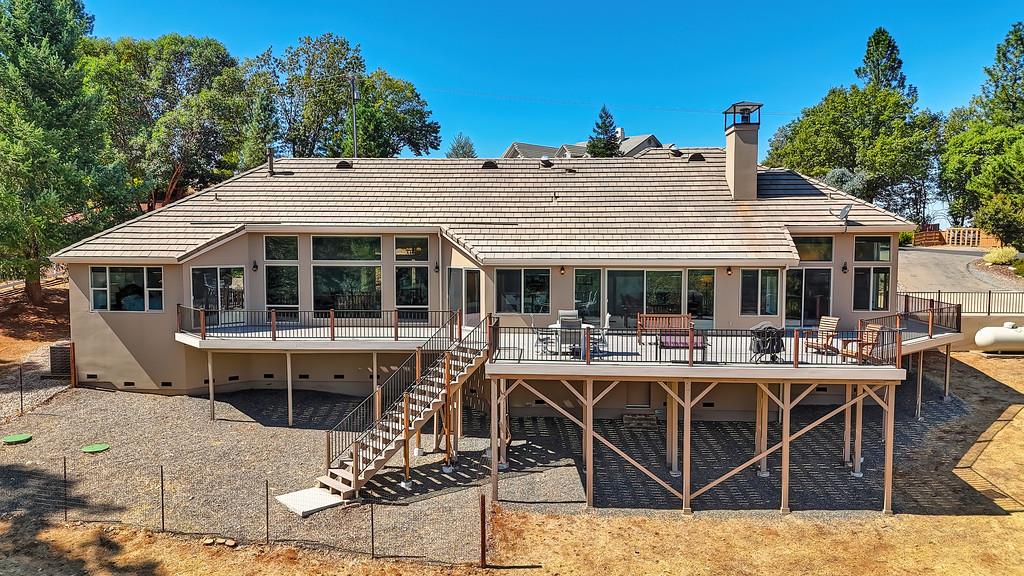 19676 Eagle Ridge Road Foresthill, CA 95631 - Photo 58 of 68 a view of a house that has a table and chairs